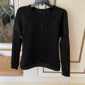 Fabletics Tilly Long Sleeve Neoprene Dreams
Black Laser Cut Sweatshirt C…